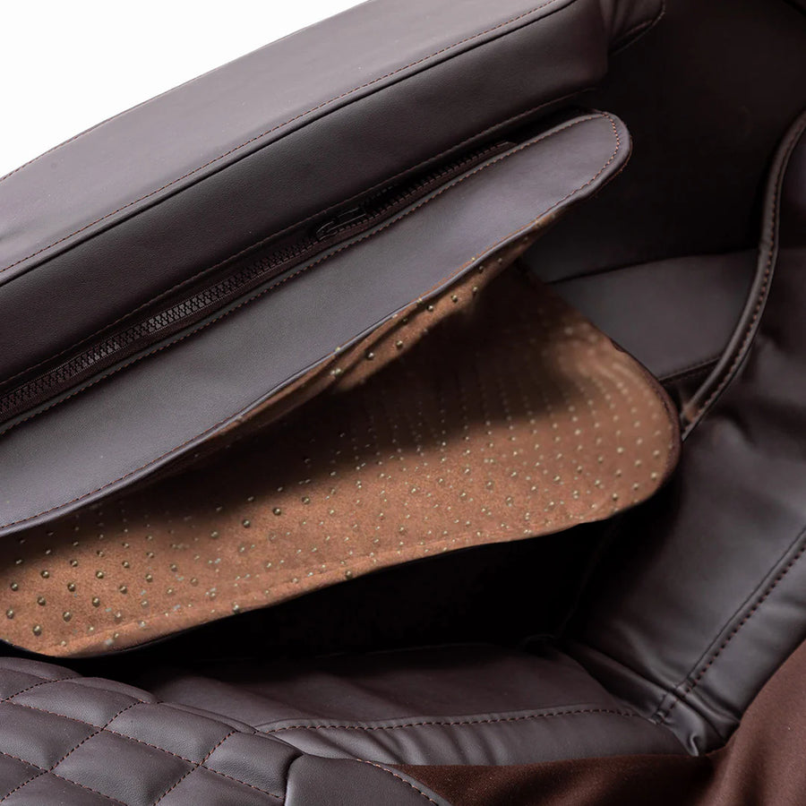Close-up of a brown leather bag with studded detail | JC Buckman RejuvenateUs 3D Massage Chair