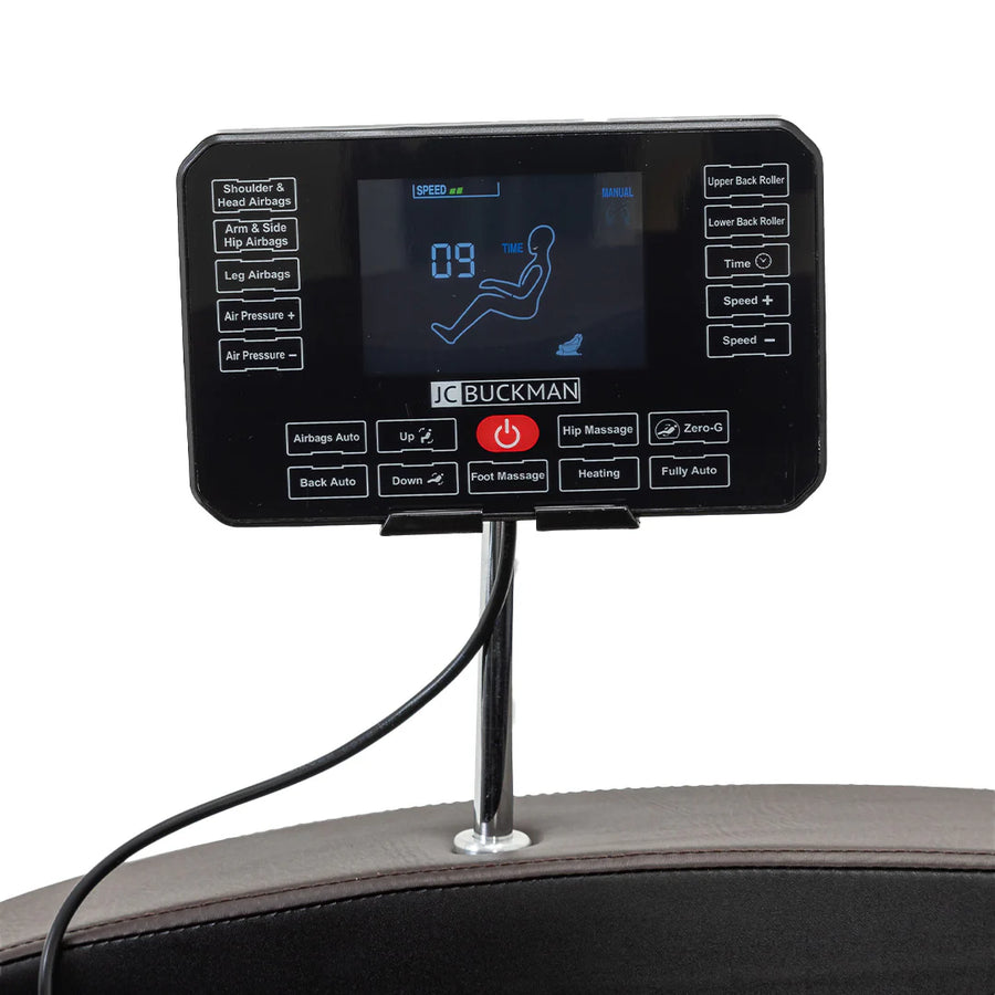 Control panel with digital display and buttons on a massage chair, featuring the JC Buckman brand.