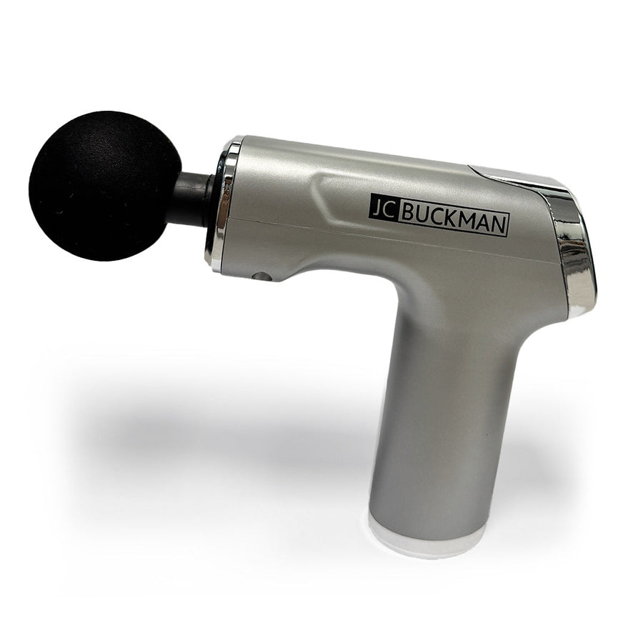 Massage gun with black head on a white background, featuring the JC Buckman brand. JoyUs Mini Massage Gun – Deep Tissue Percussion Massager for Muscle Recovery